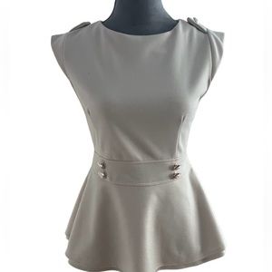 Beige peplum top. Size M